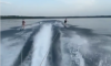 На Рівненщині чоловіки каталися озером на водних лижах (ВІДЕО)